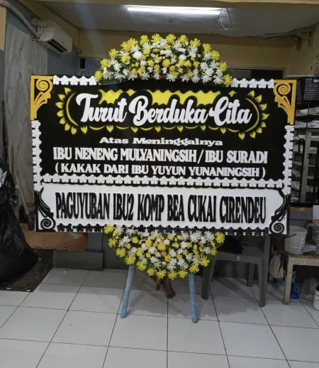 Papan Bunga Duka Jono Bayan