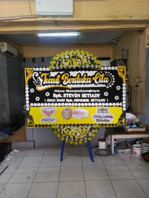 Papan Bunga di Jono Bayan